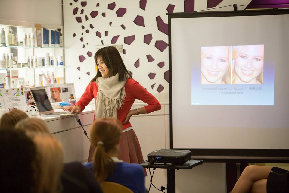Moira Wong going through the lecture with orthodontics for anti-aging.